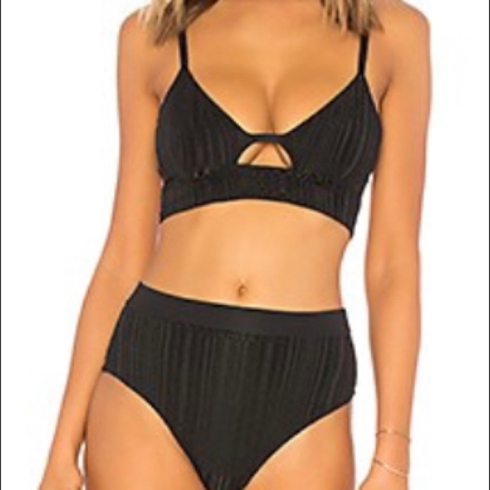 Tavik swimsuit medium top/ small bottoms
